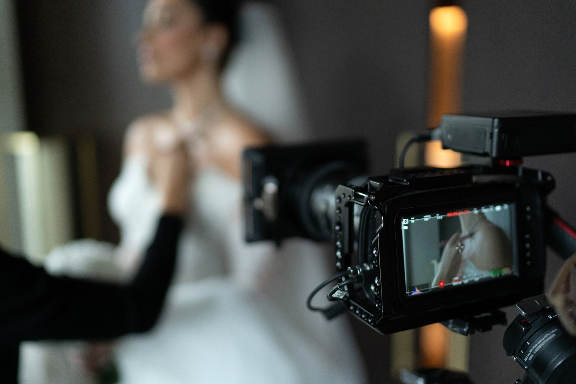 Wedding content creator filming a bride before her wedding ceremony